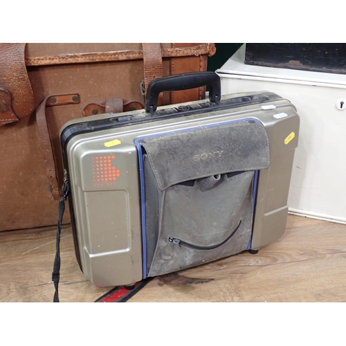 295 - An antique canvas and leather dome topped Trunk, tin Deeds Box, Luggage Cases and a Victorian black ... 