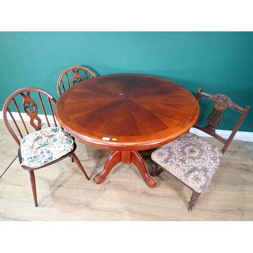 297 - A mahogany veneered Breakfast Table, two Kitchen Chairs and a Victorian Nursing Chair