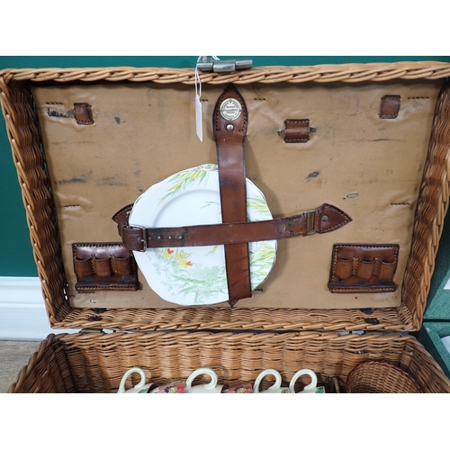 301 - A Brexton Picnic Hamper and a wicker Picnic Hamper with fitted interior by Drew & Sons, Piccadilly