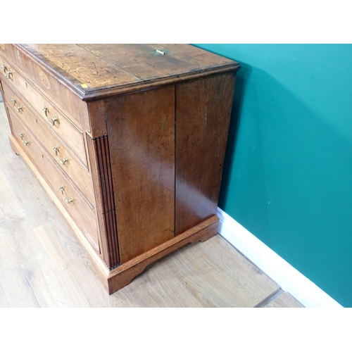 302 - A George III oak and mahogany crossbanded Lancashire Chest with shell inlay fitted two drawers mount... 