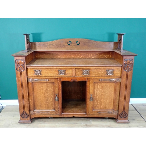 305 - An Arts and Crafts oak dog kennel Sideboard with raised gallery back fitted two frieze drawers above... 