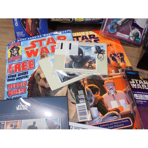 31 - A box of Star Wars Models and Collectables including boxed Imperial Troop Transporter, Monitor Mask,... 