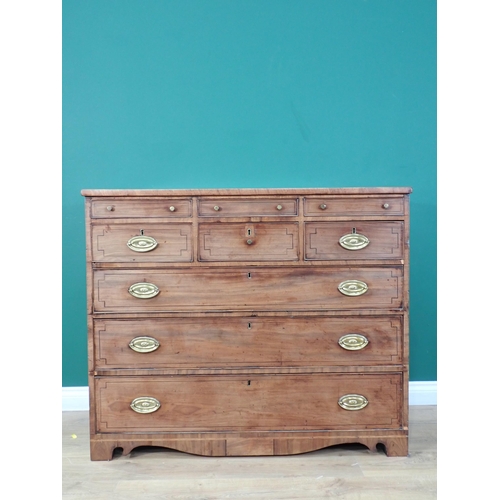 317 - A 19th Century mahogany and ebony strung Chest of six short and three long drawers on shaped bracket... 