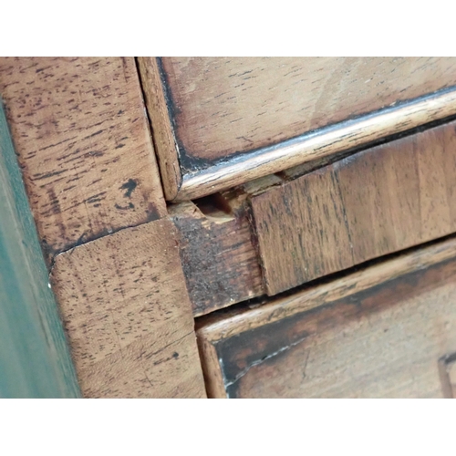 317 - A 19th Century mahogany and ebony strung Chest of six short and three long drawers on shaped bracket... 