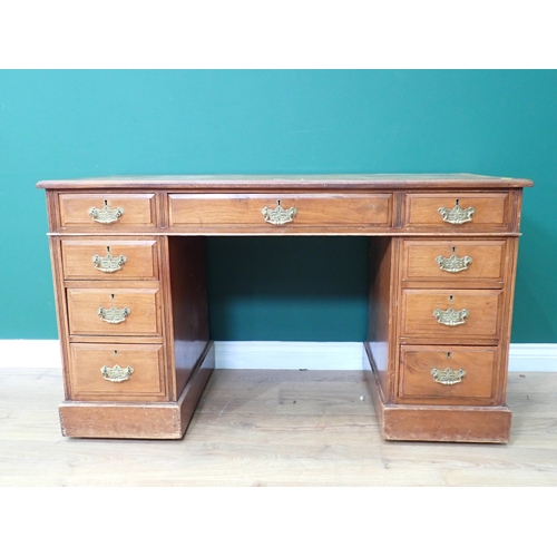 318 - A Victorian walnut pedestal Desk with tooled leather inset writing surface and fitted nine drawers 4... 