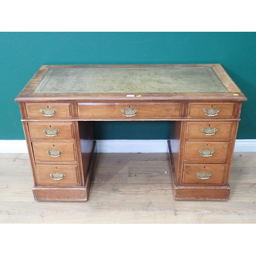 318 - A Victorian walnut pedestal Desk with tooled leather inset writing surface and fitted nine drawers 4... 