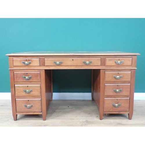 319 - An Edwardian walnut pedestal Desk with green inset writing surface 4ft 7in W x 2ft 5in H