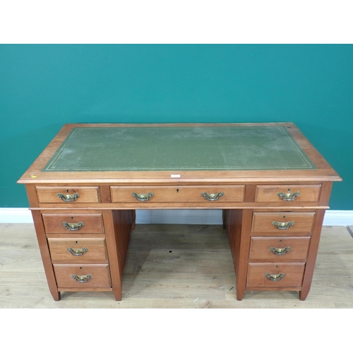 319 - An Edwardian walnut pedestal Desk with green inset writing surface 4ft 7in W x 2ft 5in H