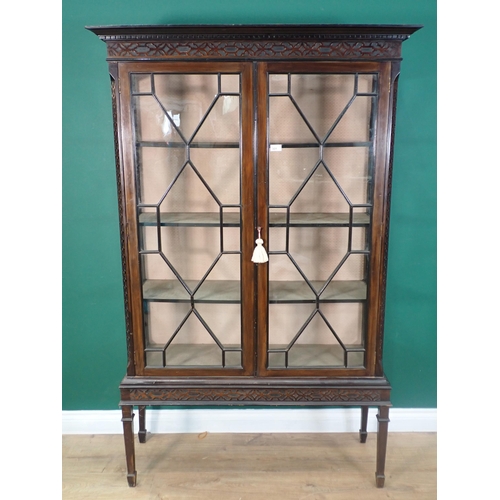 331 - A mahogany and astragal glazed Display Cabinet fitted pair of doors mounted on square cut tapering s... 