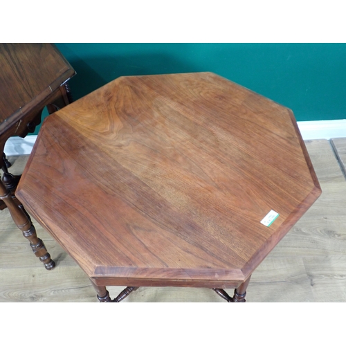 354 - Two walnut octagonal Centre Tables