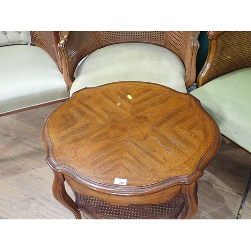 355 - A set of four cane Tub Chairs and a Coffee Table