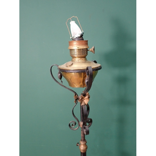 361 - Two Standard Oil Lamps on wrought iron bases and a Standard Lamp in the form of a tree in blossom