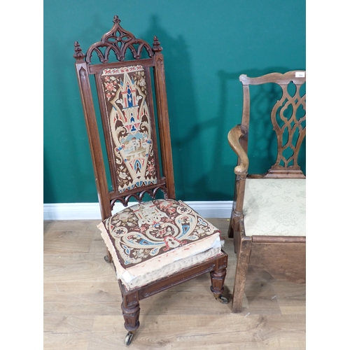 369 - A Georgian mahogany Commode Elbow Chair and a Victorian rosewood Gothic Prayer Chair