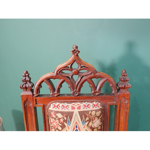 369 - A Georgian mahogany Commode Elbow Chair and a Victorian rosewood Gothic Prayer Chair