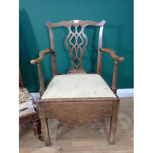 369 - A Georgian mahogany Commode Elbow Chair and a Victorian rosewood Gothic Prayer Chair