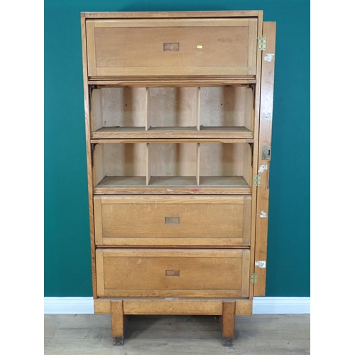 378 - An oak five tier Bookcase with lifting cupboard fronts 6ft H x 3ft W