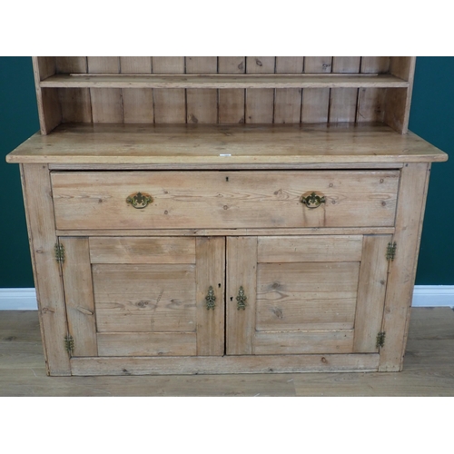 380 - A 19th Century pine enclosed Dresser and Rack fitted single deep drawer above pair of cupboard doors... 