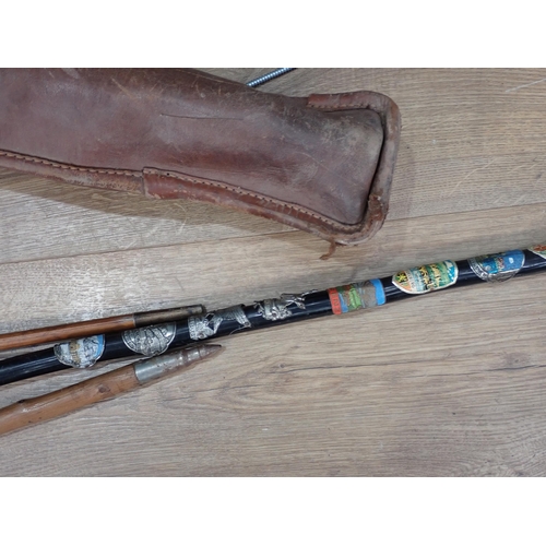 384 - Two leather Gun Cases, two Shooting Sticks, various Walking Sticks two Hip Flasks, Saddle Cups, a Ca... 