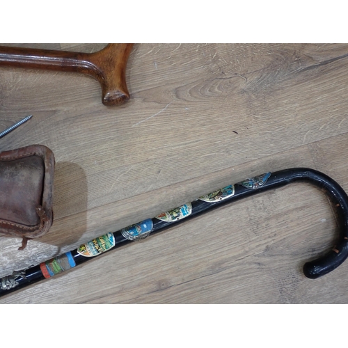 384 - Two leather Gun Cases, two Shooting Sticks, various Walking Sticks two Hip Flasks, Saddle Cups, a Ca... 