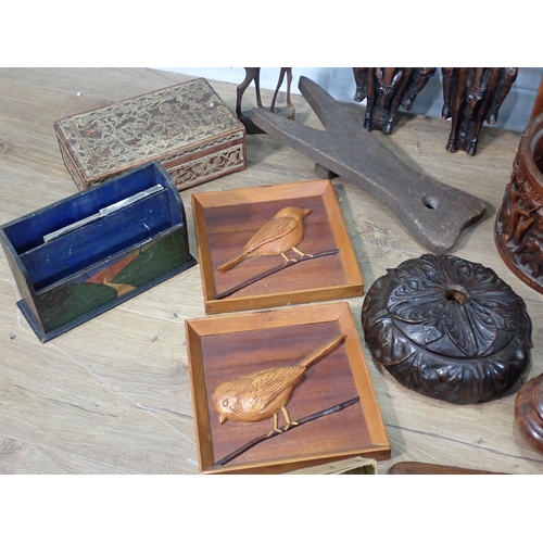 39 - A box of Carvings and Treen including African Fruit Bowl, oak Casket, Boot Jack, Boomerang, Puppet, ... 