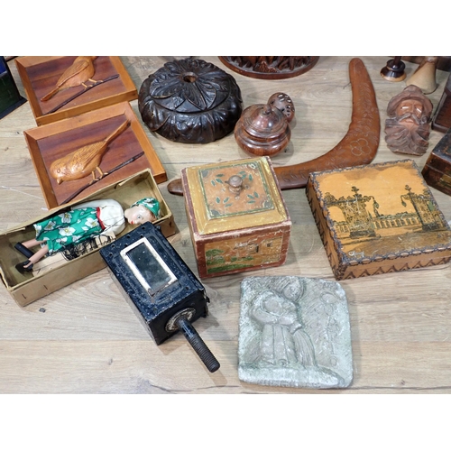 39 - A box of Carvings and Treen including African Fruit Bowl, oak Casket, Boot Jack, Boomerang, Puppet, ... 