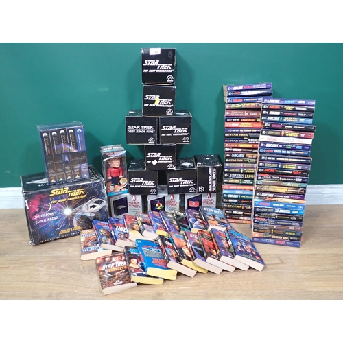 40 - A box of Star Trek Collectables including Clock Radio, Mugs and a box of Star Trek Books