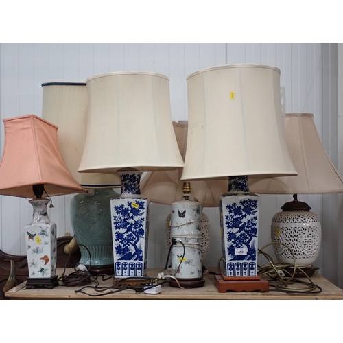 453 - A quantity of Table Lamps including a pair of square section in blue and white, a pair with white pi... 