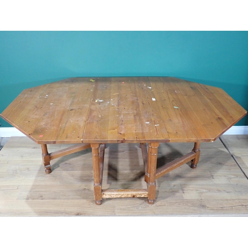 475 - A pine octagonal gateleg Dining Table 4ft 2in W x 2ft 5in H