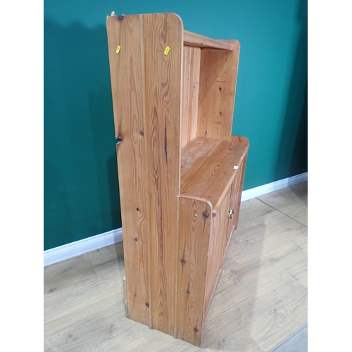 477 - A pine Cupboard with raised back fitted two doors to base 5ft H x 3ft 9in W