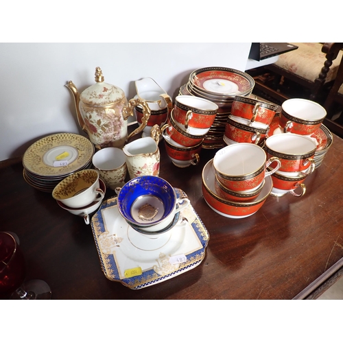 483 - A Grosvenor China part Tea Set, Tea Cups and Saucers and a gilded Coffee Pot