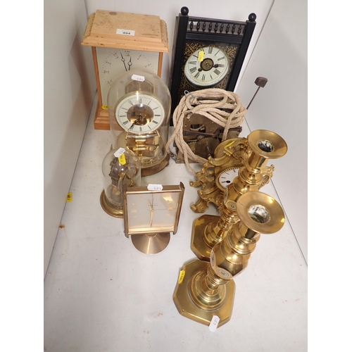 494 - A quantity of Clocks including a French gilt metal Mantel Clock, two Clocks under glass domes, a Clo... 