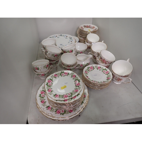 509 - Two Colclough part Tea Sets with rose design, plates etc