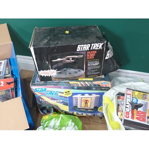 51 - A boxed Star Trek Transporter, Star Trek Alarm Clock and a box and two bags of CDs/PC Games