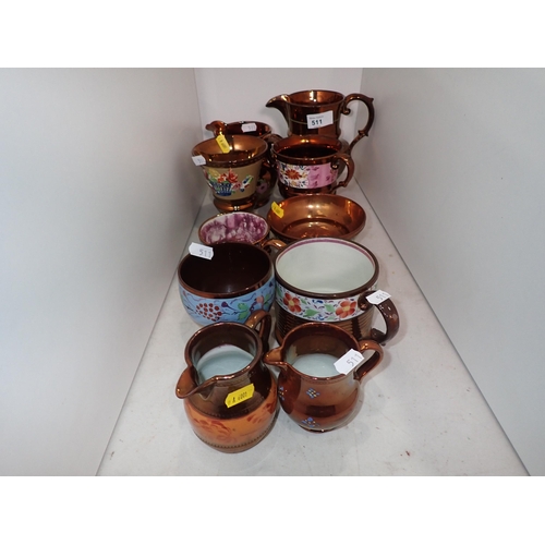 511 - A quantity of copper Lustreware including Jugs, Goblets, Mugs, etc