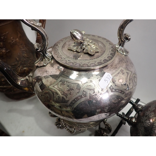 532 - Two plated Kettles on Stand with engraved decoration, a large moulded pottery Jug embossed decoratio... 