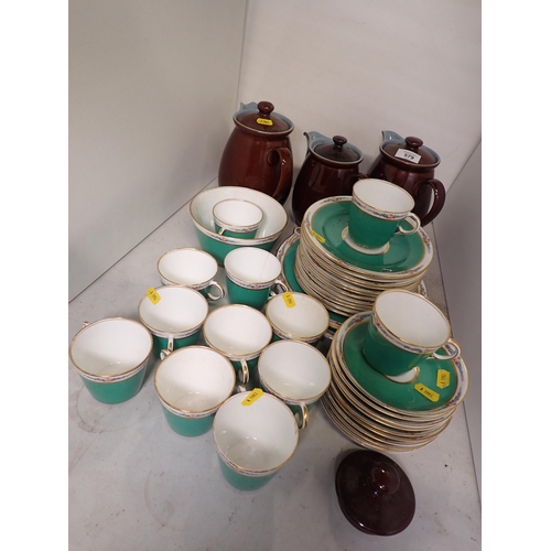 579 - Three Denby Coffee Pots and a green glazed part Tea Set