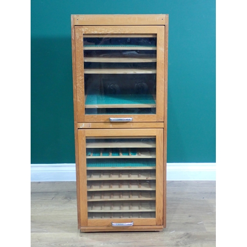 58 - An oak and glazed Haberdashery Shop Cabinet with Dewhurst's Logo Sticker 3ft 1in H x 1ft 3in W, a gi... 