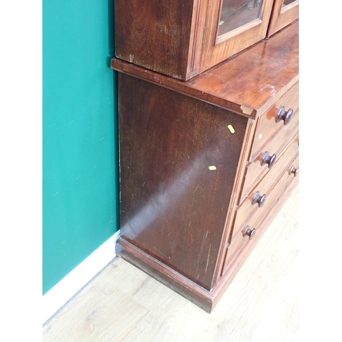 594 - A Victorian mahogany Secretaire Bookcase fitted pair of arched glazed doors above base fitted four d... 