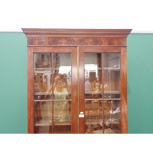 618 - A Georgian style mahogany and glazed Bookcase fitted pair of doors enclosing adjustable shelves moun... 