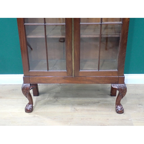 618 - A Georgian style mahogany and glazed Bookcase fitted pair of doors enclosing adjustable shelves moun... 