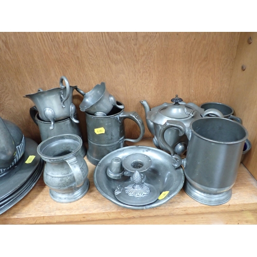 626 - A pair of 19th Century pewter Candlesticks, five Tankards, Chamberstick, five Plates, etc.