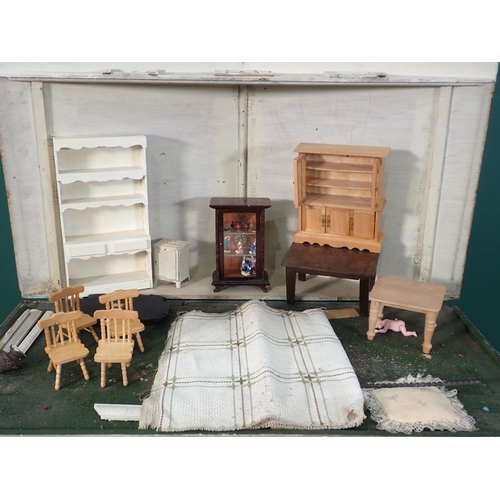 63 - A white painted Doll's House with a quantity of furniture 2ft 10in H x 2ft 3in W