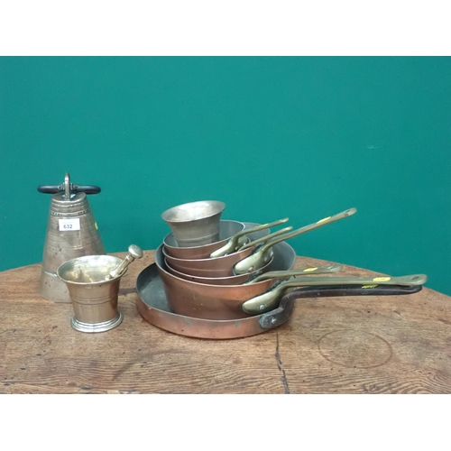 632 - An antique Cooking Pan, four graduated Pans, brass Pestle and Mortar, Mortar, a Bell and a small mah... 