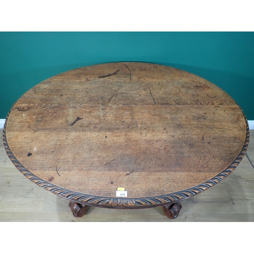 635 - A Victorian oak extending Dining Table mounted on bulbous carved supports and scroll feet (lacking s... 