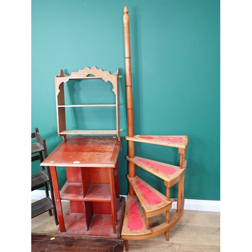 65 - An oak veneered Revolving Bookcase, set of Shelves, Wall Shelves and a set of Library Steps