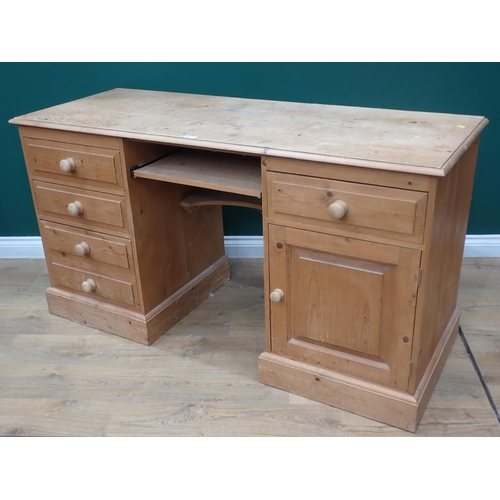 666 - A modern pine pedestal Writing Desk fitted three drawers and a cupboard door 5ft W x 2ft 8in H