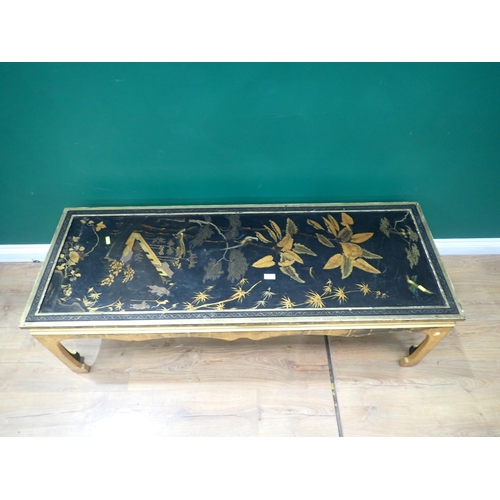 671 - A Chinese style lacquered Coffee Table 4ft 9in W x 1ft 6in H