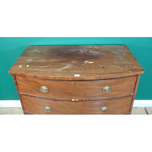 677 - A 19th century mahogany bow front Chest of three long graduated drawers, shaped apron on splayed bra... 