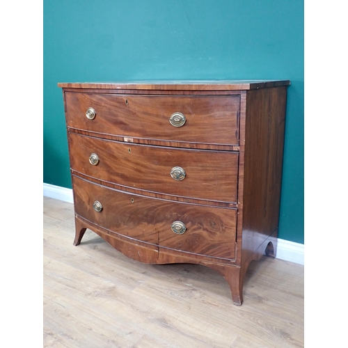 677 - A 19th century mahogany bow front Chest of three long graduated drawers, shaped apron on splayed bra... 