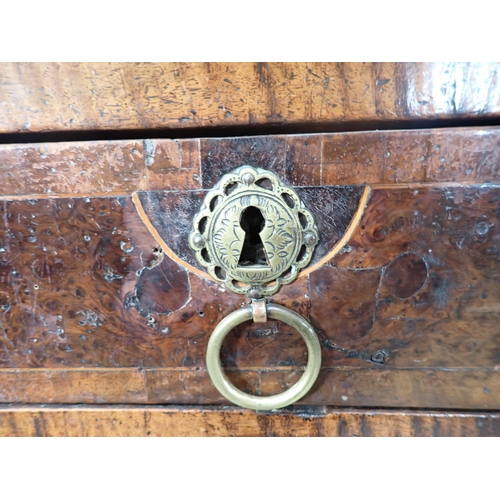 678 - An 18th Century oak and walnut veneered Chest with moulded top over two short and three graduated lo... 